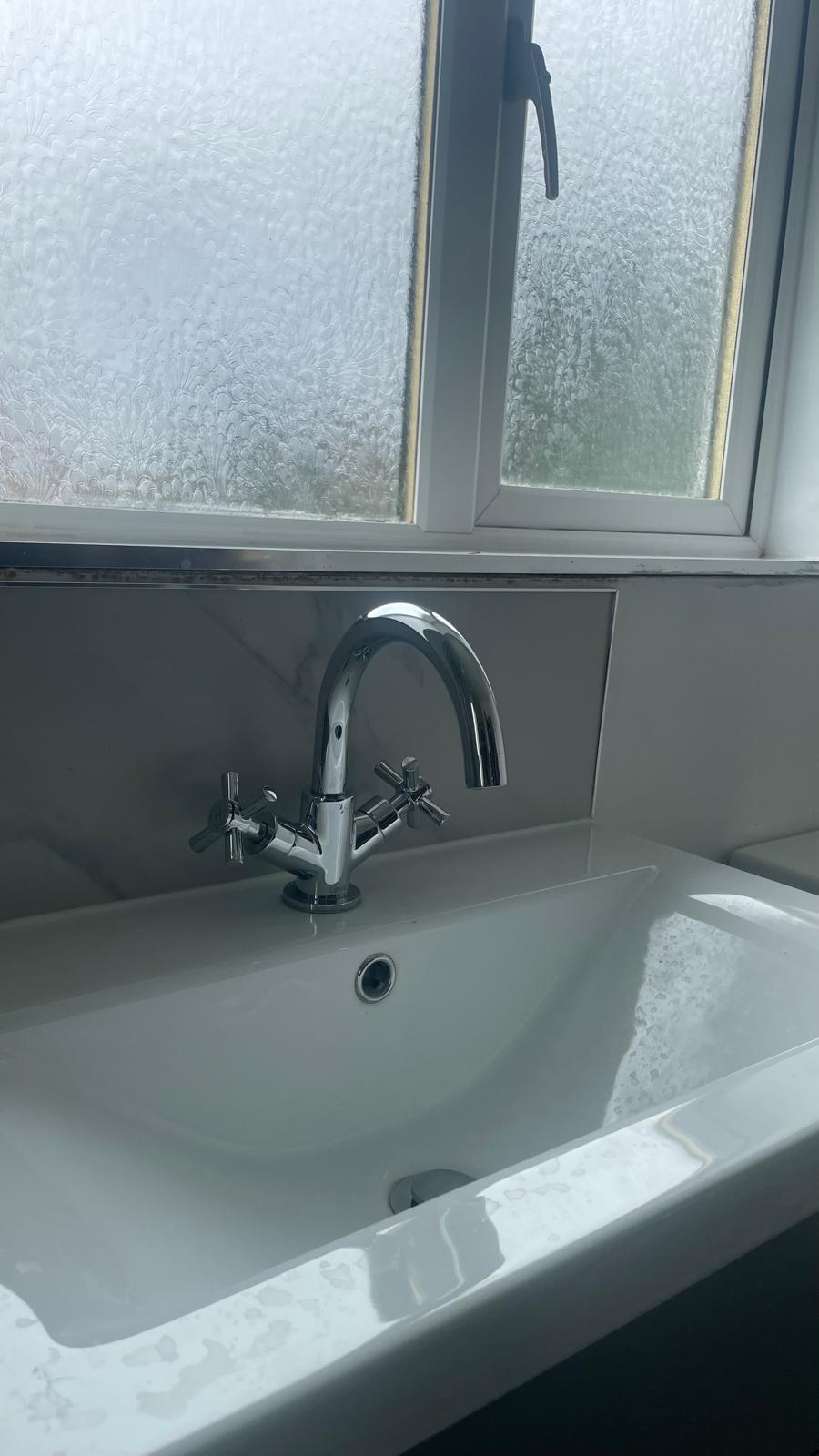 New basin with chrome tap fitted in Walsall bathroom